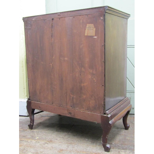 2683 - A Georgian mahogany chest of four long graduated drawers raised on a later stand with short cabriole... 