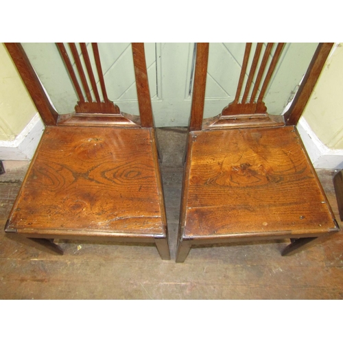 2686 - A pair of 18th century oak cottage dining/side chairs of simple form with pierced splats, shaped cre... 