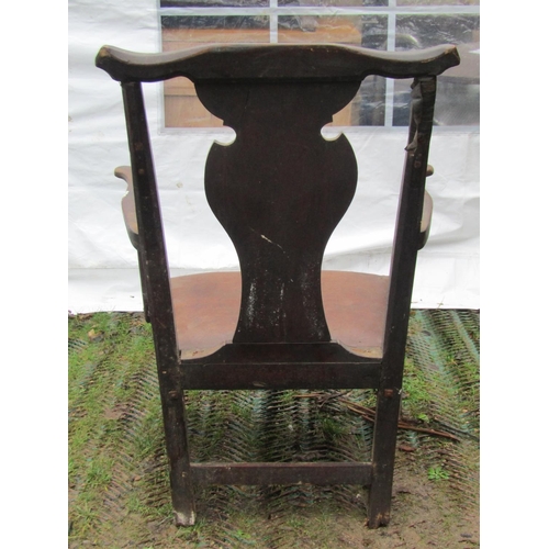 2057a - A Georgian open elbow chair with yoke shaped cresting rail and wide vase shaped splat, generous drop... 