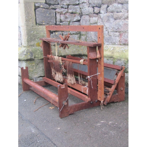 2068 - A vintage oak and pine framed loom together with various spools of wool