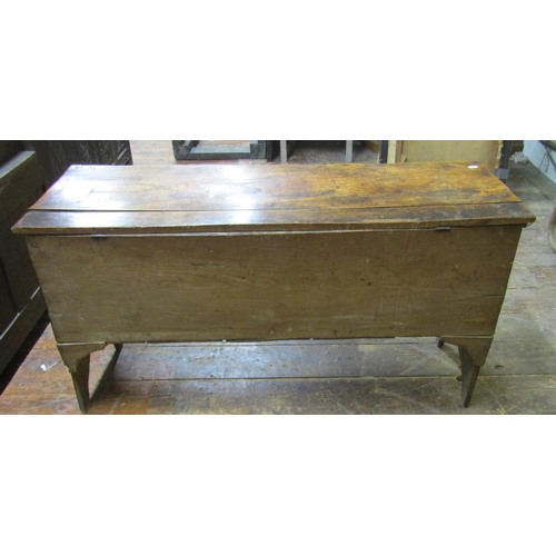 2658 - An 18th century elm six plank coffer of simple construction on shaped supports, 122 cm in length x 6... 