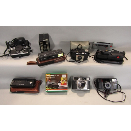 585 - A box of mixed cameras to include a box Brownie and others