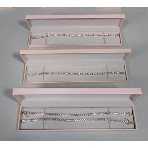 1424 - Collection of cased Diamonique silver and cubic zirconia jewellery to include four tennis bracelets