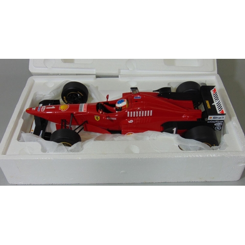 8 - Ferrari F310/2 model racing car from the Michael Schumacher Collection by Pauls Model Art, 1:12 scal... 