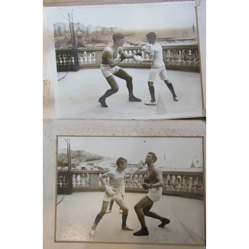 422 - A quantity of early 20th century black and white photographs of young boxers together with a poster ... 