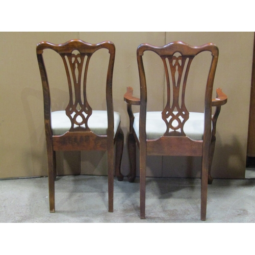 2161 - A set of six (4&2) contemporary reproduction Georgian style dining chairs with pierced vase shaped s... 