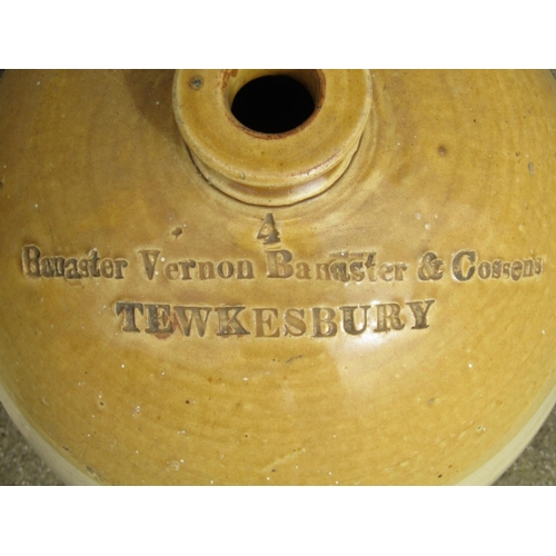 2169 - A 19th century four gallon stoneware two tone flagon with impressed merchants mark for Bannister Ver... 