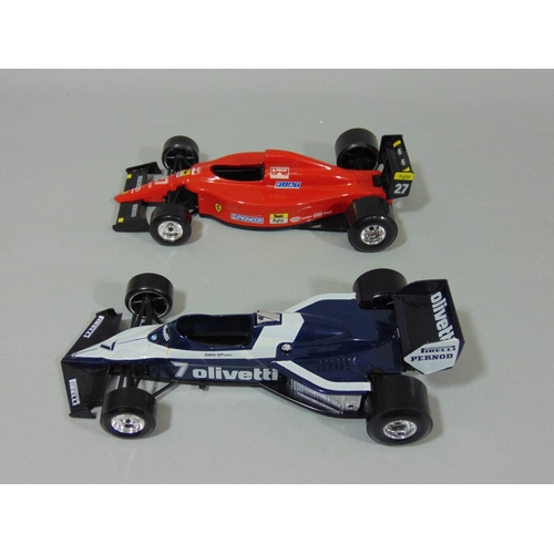 69 - 4 unboxed Formula 1 model racing cars 1:24 scale by Burago including Brabham BT52, Lotus 97T, Ferrar... 