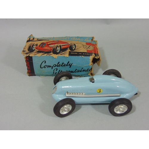 73 - 2 boxed 1940'5/50's toy motor cars 'The Mighty Midget Electric Racer',  with fitted with small elect... 