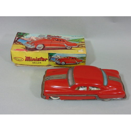 73 - 2 boxed 1940'5/50's toy motor cars 'The Mighty Midget Electric Racer',  with fitted with small elect... 