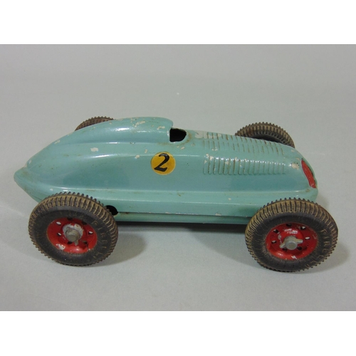 74 - 3 unboxed 1940's/50's toy cars 'The Mighty Midget Electric Racer' (AF), together with a small bag of... 