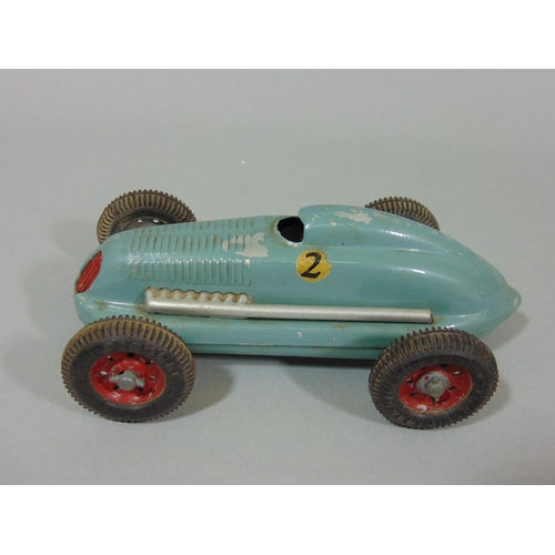 74 - 3 unboxed 1940's/50's toy cars 'The Mighty Midget Electric Racer' (AF), together with a small bag of... 