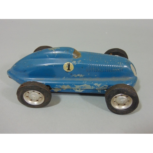 74 - 3 unboxed 1940's/50's toy cars 'The Mighty Midget Electric Racer' (AF), together with a small bag of... 