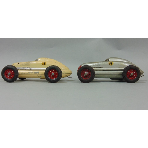 79 - 2 unboxed 1940's/50's toy cars 'The Mighty Midget Electric Racer' in cream and silver (2)