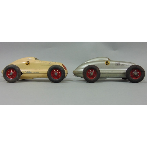 79 - 2 unboxed 1940's/50's toy cars 'The Mighty Midget Electric Racer' in cream and silver (2)