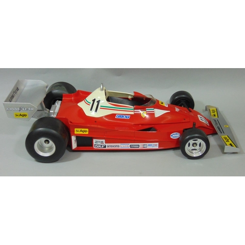 81 - Static kerbside 1:6 scale model of Formula 1 Ferrari 312 T2 racing car by Toschi/ Polistil, in displ... 