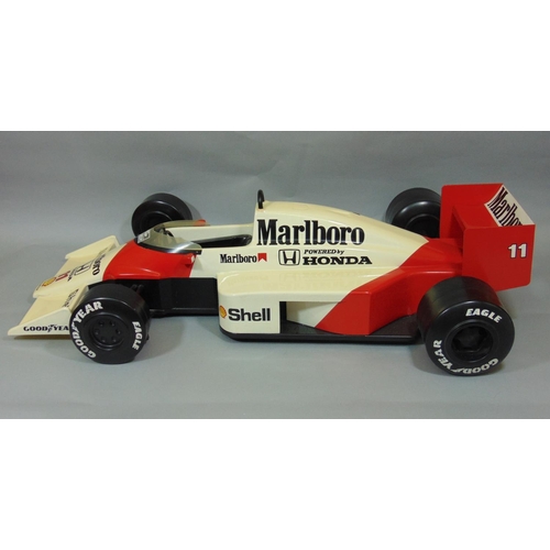 82 - Large static kerbside model of McLaren Honda Formula 1 Racing Car MP4/4 1988, likely to have been gi... 