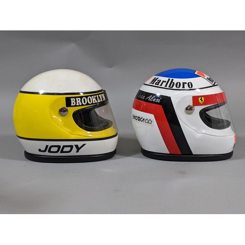 86 - 2 boxed Formula 1 replica model helmets for Jean Alesi and Jody Scheckter, by RB Formula, 1:3 scale,... 