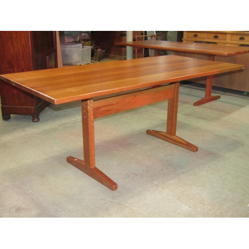 2209 - A contemporary cherry wood refectory table with rectangular top raised on a trestle type base, 183cm... 