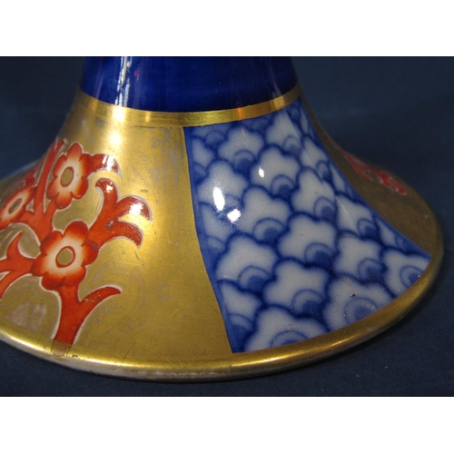 1079 - An early 20th century Macintyre two handled cup with elongated stem and with painted and gilded styl... 