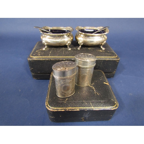 1260 - Cased pair of Walker & Hall silver salts, with blue glass liners, the case 19 cm long; together with... 