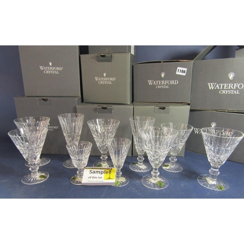 1166 - A collection of boxed Waterford Tramore pattern glassware comprising sherry glasses, 10 oz goblets, ... 