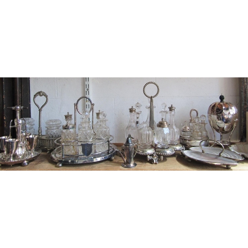 1218 - Four various silver plated and glass bottle cruets (2 AF), together with a further coddler, egg cup ... 