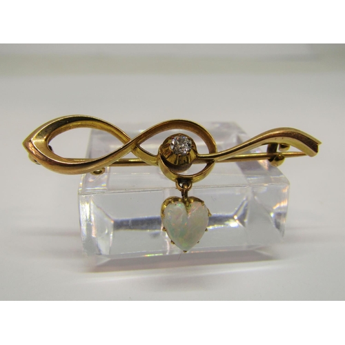 1333 - Antique yellow metal brooch set with a diamond and articulated heart shaped opal drop, 4.3cm W appro... 