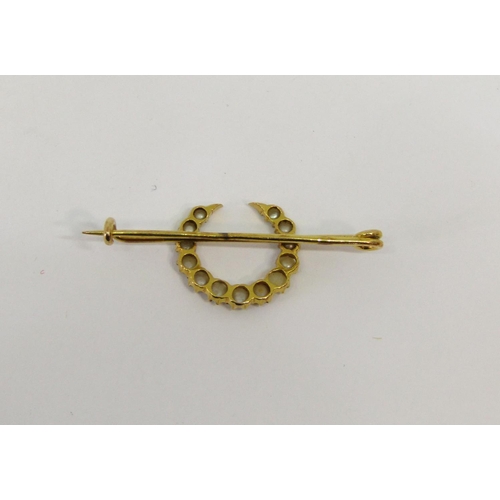 1341 - Victorian yellow metal crescent brooch set with seed pearls, 3.8cm W approx, 2g