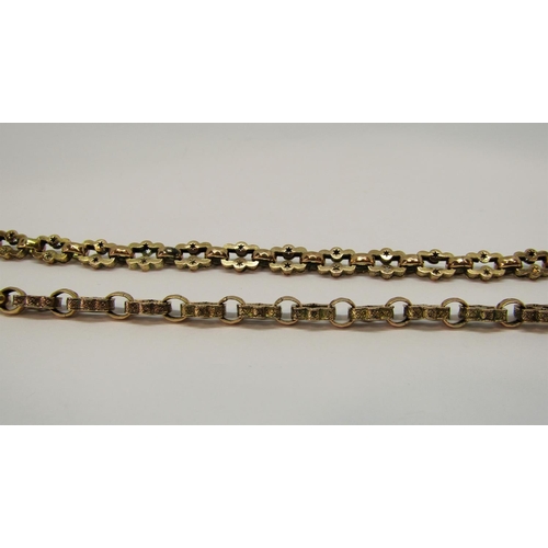 1355 - 9ct fancy link double Albert chain with T-bar and star-cut decoration, 31.8g