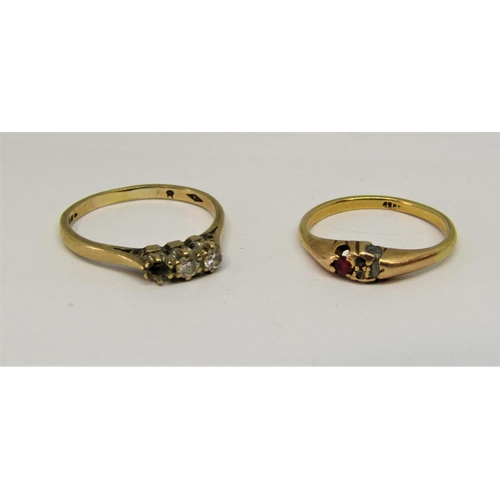 1378 - 18ct ruby ring, 2.5g (soldered) and a further 9ct diamond ring, 2g (one stone vacant) (2)