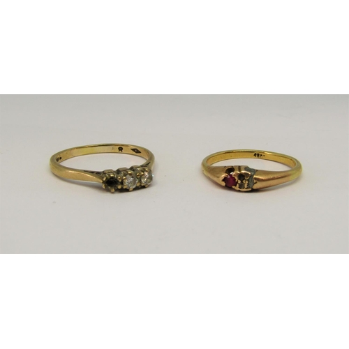 1378 - 18ct ruby ring, 2.5g (soldered) and a further 9ct diamond ring, 2g (one stone vacant) (2)