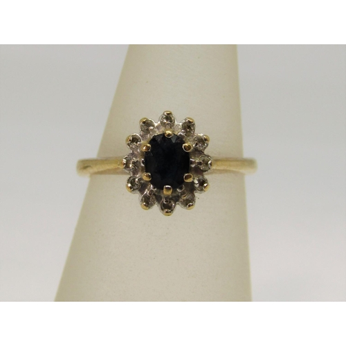 1381 - Two 9ct sapphire and diamond cluster rings, together with a further 9ct paste ring - 6g total and a ... 