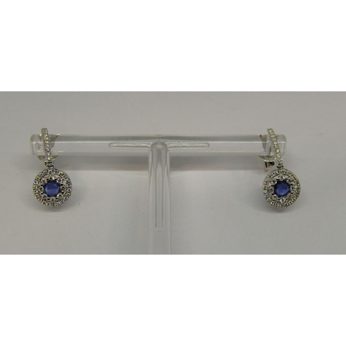 1393 - Pair of 18ct white gold sapphire and diamond cluster drop earrings, 3.6g