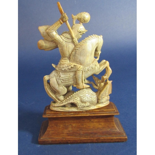 1516 - 19th century probably Dieppe ivory carved stained ivory figure of St George slaying the dragon, upon... 