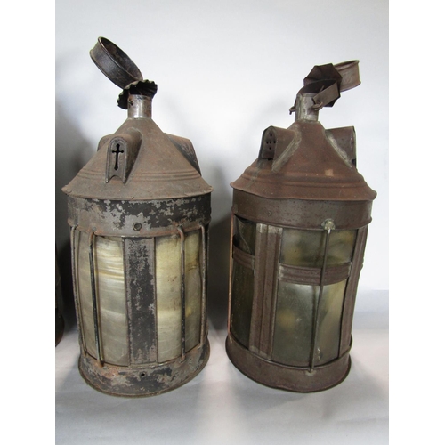 1609 - A collection of four similar conical lanterns, three with vellum type panels and grill frontage, the... 