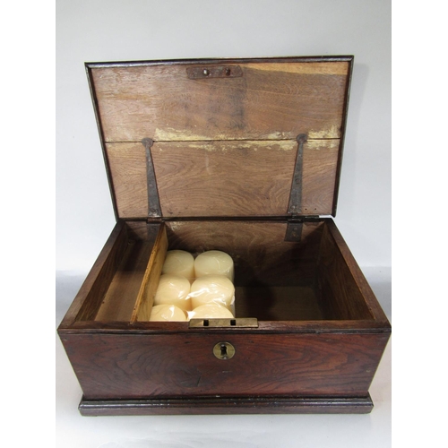 1627 - 18th century elm coffer bach type box, the hinged lid enclosing an interior fitted with a candle box... 