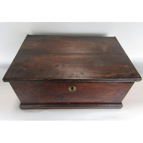 1627 - 18th century elm coffer bach type box, the hinged lid enclosing an interior fitted with a candle box... 