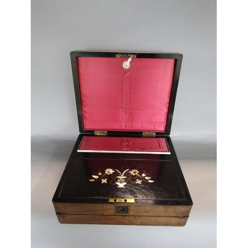 1632 - 19th century rosewood writing slope of small proportions, the hinged lid enclosing an ebonised inter... 