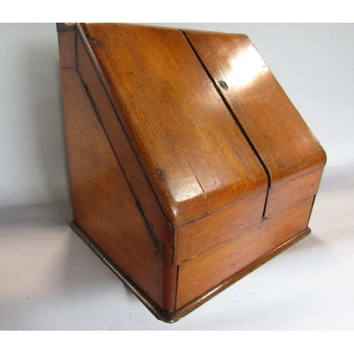 1635 - Early 20th century golden oak desk top box, the sloped top enclosing a waterfall interior and recess... 