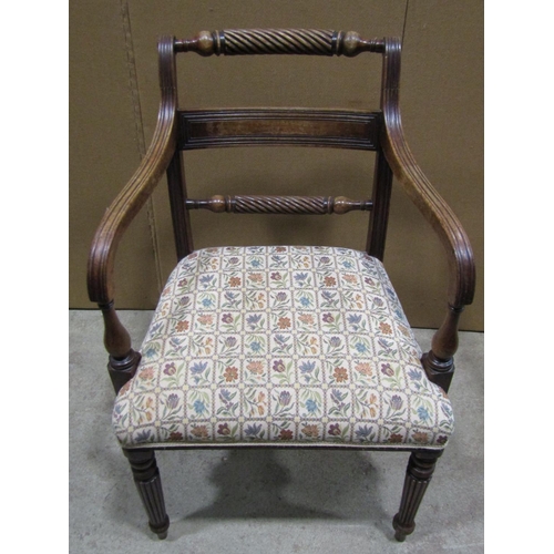 2248 - A Regency mahogany open elbow chair with rope twist and reeded bar splats over an upholstered seat r... 