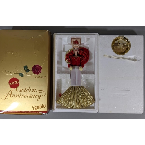 123 - 4 boxed themed Barbie dolls including  'Harpist Angel', 'Golden Anniversary 1945-1995', 'Barbie as t... 