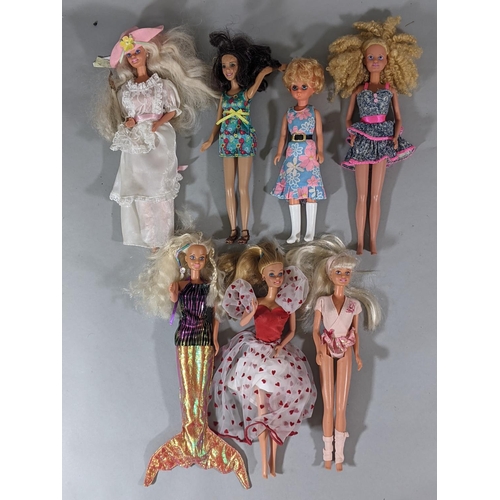 123 - 4 boxed themed Barbie dolls including  'Harpist Angel', 'Golden Anniversary 1945-1995', 'Barbie as t... 