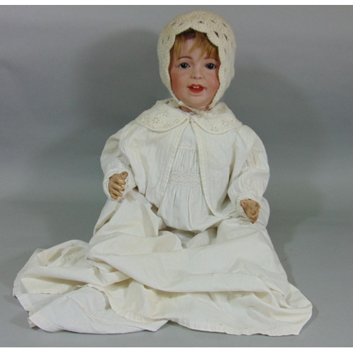 128 - Circa 1910 bisque head baby doll by SFBJ, a 'Laughing Jumeau', with 5 piece bent limb composition bo... 