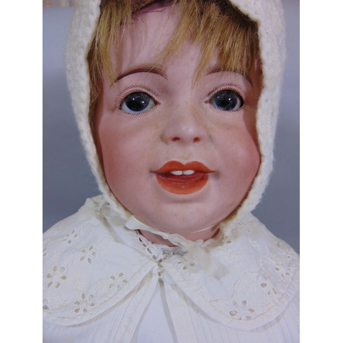 128 - Circa 1910 bisque head baby doll by SFBJ, a 'Laughing Jumeau', with 5 piece bent limb composition bo... 