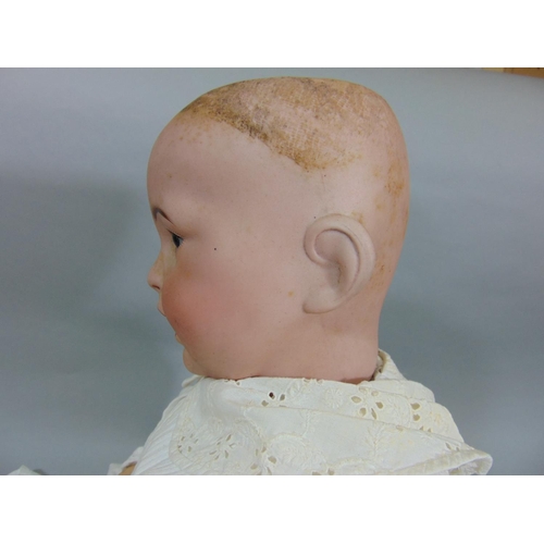 128 - Circa 1910 bisque head baby doll by SFBJ, a 'Laughing Jumeau', with 5 piece bent limb composition bo... 