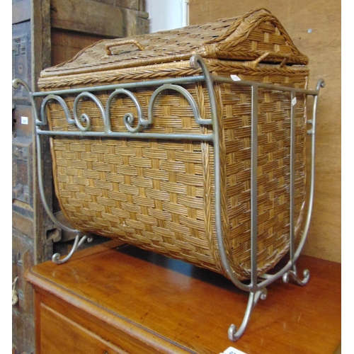 2311 - A contemporary domed top wicker basket housed within a steel stand/cradle together with an Indian ha... 