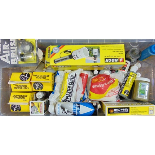 108 - Large boxful of railway modelling materials including rolls of plaster cloth, paints, spray gun, Hyd... 