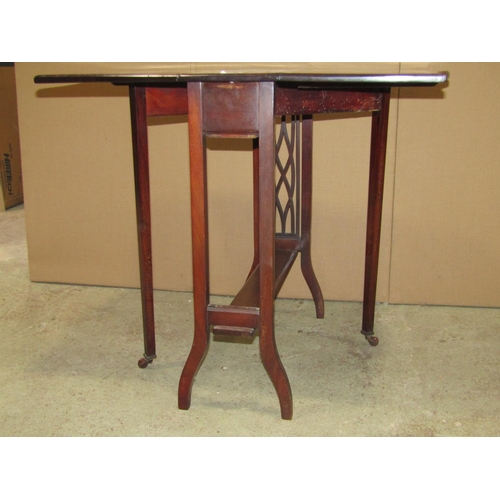 2349 - An inlaid Edwardian mahogany drop leaf Sutherland type table with satinwood banding, serpentine outl... 