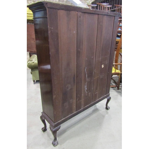 2354 - A Georgian revival side cabinet with dentil moulded cornice over a pair of rectangular astragal glaz... 